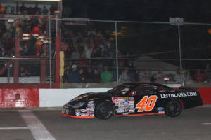 CE Falk wins 10 Late Model features and 2010 track championship at Langley Speedway using Bassett 15x10 Wide-Five Wheels.